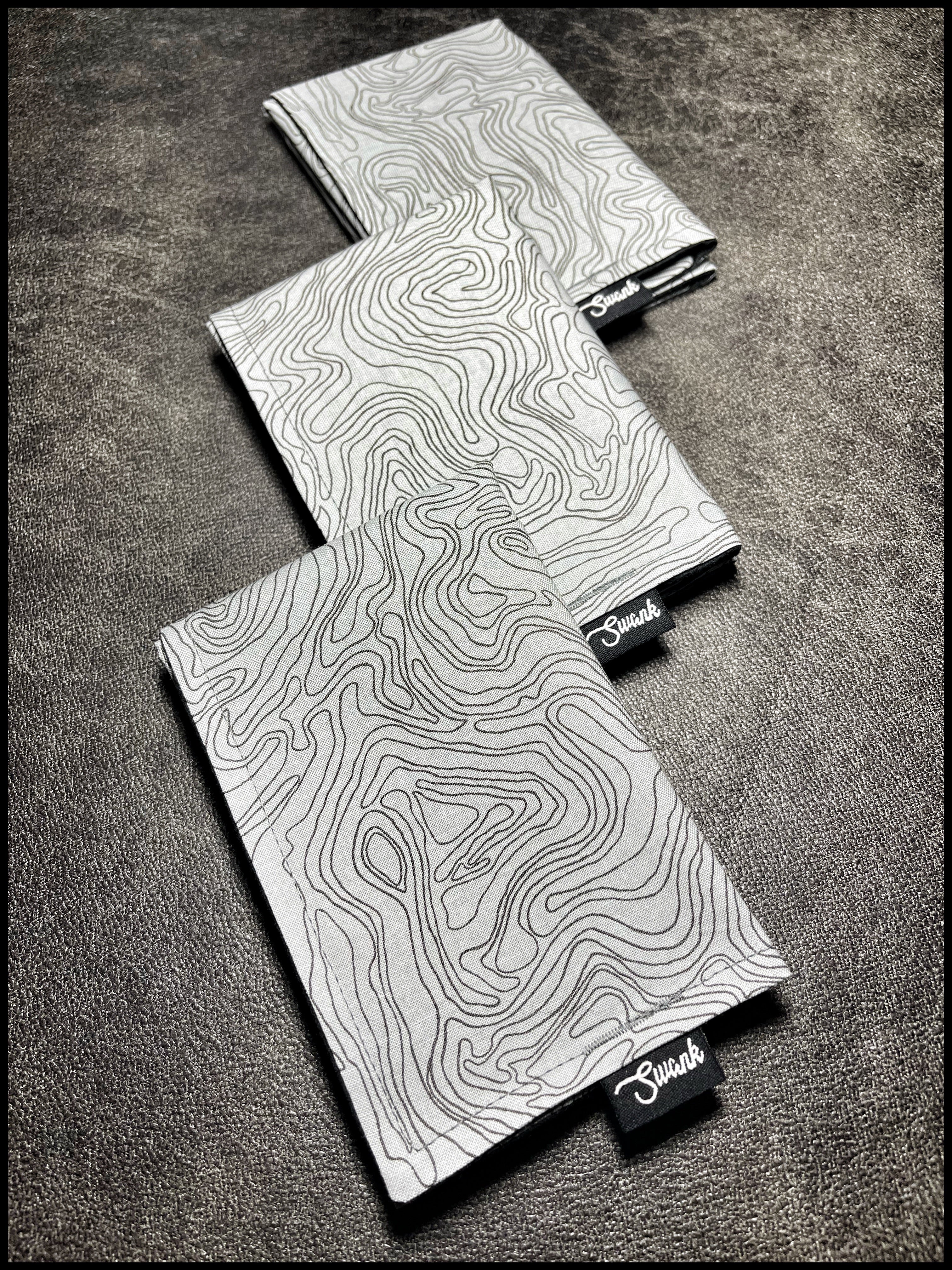 - GREY TOPO HANK -
