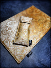 Golden paisley silk pouch